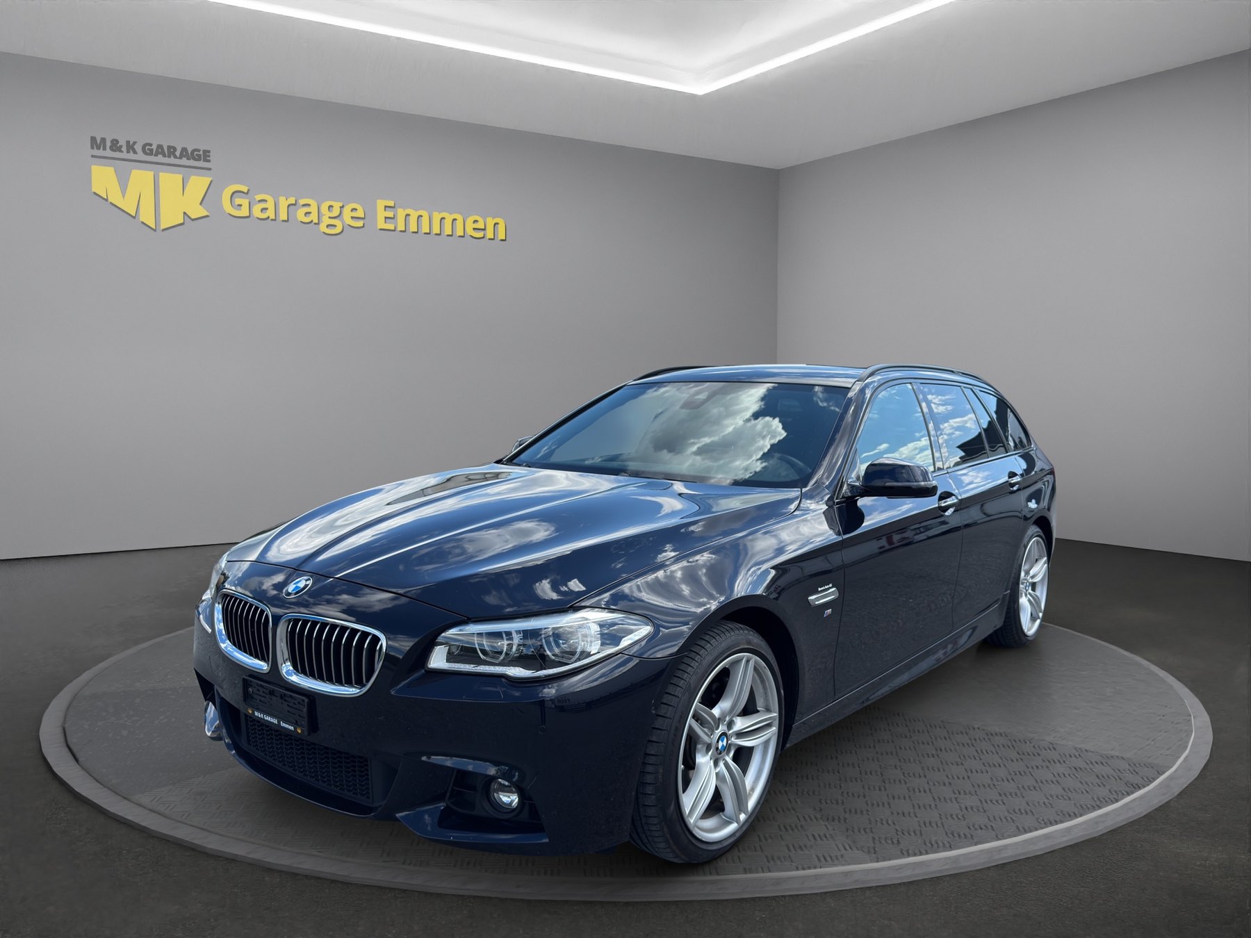 BMW 535i Touring xDrive front three-quarter view